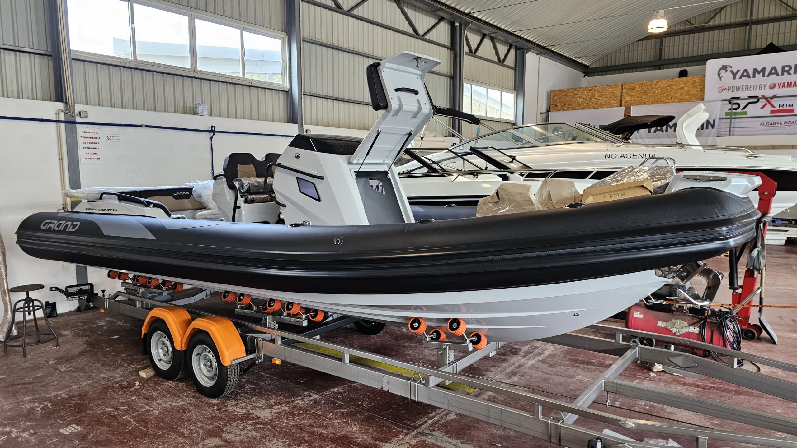 A GRAND RIB on a trailer inside the Algarve Boat Sales workshop